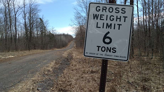 A road sign that reads Gross weight Limit 6 tons