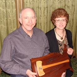 photo of Dave and Cindy Berthiaume receiving the FRA National Outstanding Logger of the Year Award in 2010.