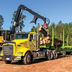 image of logging truck getting loaded