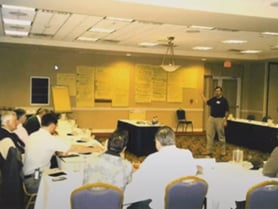 image of FRA workshop with attendees in classroom