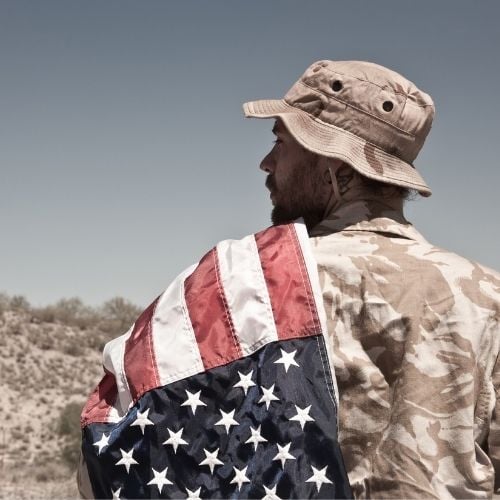 Man in uniform with american flag on shoulder